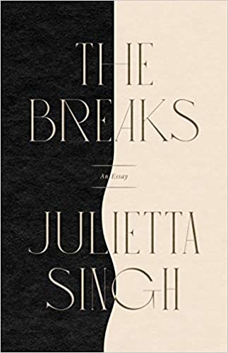 Cover photo of The Breaks, showing a breakage between the black and beige coloured sides of the page.